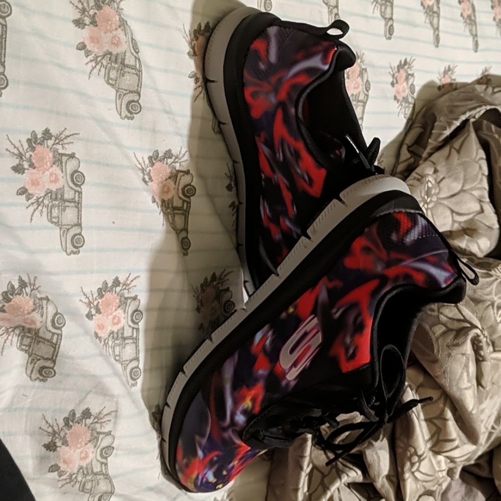 Multi colored never worn skechers